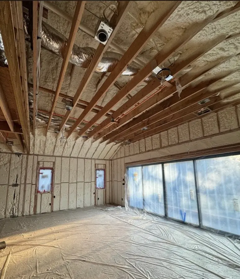 Interior walls and ceiling insulated with spray foam during new construction in Santa Paula